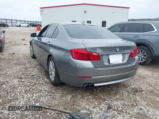 2013 BMW 5 Series 528i with VIN WBAXG5C5XDD229845, listed as a IAAI auction lot 41457088 with 130,826 mi miles and . Bid and sale history available at carsss.com. Image 3.