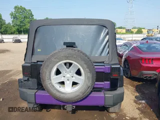 2014 Jeep Wrangler Unlimited Sahara with VIN 1C4BJWEG6EL217945, listed as a IAAI auction lot 42388477 with 61,739 mi miles and . Bid and sale history available at DreamBid. Image 17.