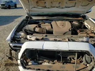 2020 Toyota Tacoma SR5 with VIN 3TMCZ5AN4LM303536, listed as a Copart auction lot 68973025 with 125,274 mi miles and Salvage title. Bid and sale history available at DreamBid. Image 16.