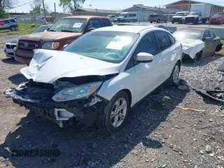 2014 Ford Focus SE with VIN 1FADP3F28EL370650, listed as a IAAI auction lot 41989922 with 142,599 mi miles and . Bid and sale history available at carsss.com. Image 2.