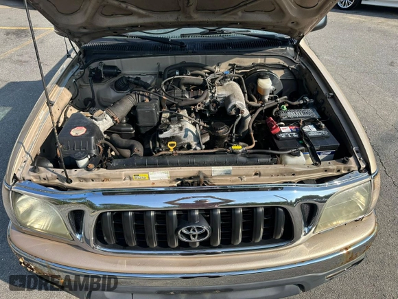2002 Toyota Tacoma z VIN 5TEPM62N42Z897969, wystawiony jako Copart lot #60794585 z przebiegiem 138 463 mil mil oraz Czysty tytuł • Clean title. Historia ofert i sprzedaży dostępna na DreamBid. Obrazek 6.