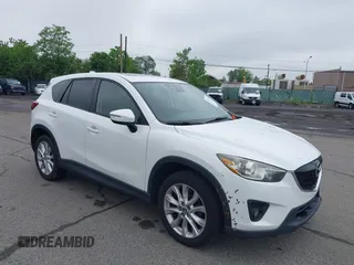 2015 Mazda CX-5 Grand Touring with VIN JM3KE4DY5F0530854, listed as a IAAI auction lot 42274582 with 144,732 mi miles and . Bid and sale history available at DreamBid. Image 6.