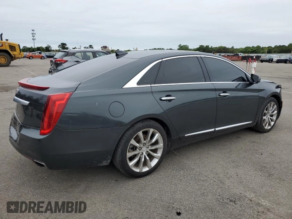 2016 Cadillac XTS Luxury Collection with VIN 2G61N5S34G9120168, listed as a Copart auction lot 61776225 with 83,721 mi miles and Salvage title. Bid and sale history available at DreamBid. Image 3.