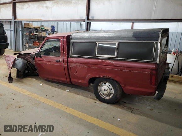 1991 Ford Ranger with VIN 1FTCR10A7MUD28922, listed as a Copart auction lot 87198864 with 98,759 mi miles and Salvage Title. Bid and sale history available at carsss.com. Image 2.