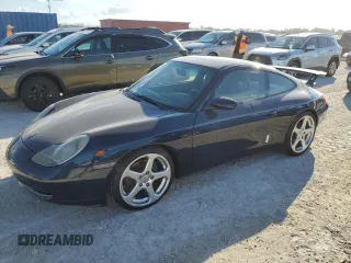 2000 Porsche 911 z VIN WP0AA2996YS621130, wystawiony jako Copart lot #77096434 z przebiegiem Nie podano mil oraz Szkoda całkowita • Salvage title. Historia ofert i sprzedaży dostępna na DreamBid. Obrazek 1.