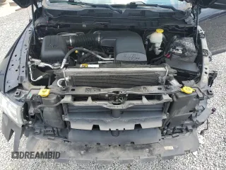2018 Ram 1500 SLT with VIN 1C6RR6GG2JS114520, listed as a Copart auction lot 58843675 with 122,112 mi miles and Salvage title. Bid and sale history available at DreamBid. Image 11.