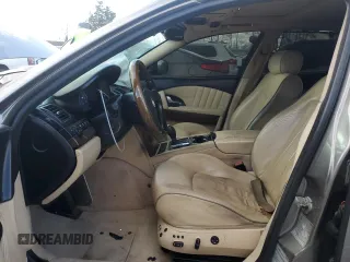 2009 Maserati Quattroporte z VIN ZAMFK39A690044644, wystawiony jako Copart lot #41343985 z przebiegiem 106 624 mil mil oraz Szkoda całkowita • Salvage title. Historia ofert i sprzedaży dostępna na DreamBid. Obrazek 7.