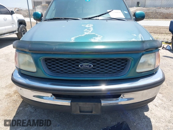 1998 Ford F-150 with VIN 1FTZX17W3WKB90294, listed as a IAAI auction lot 42676059 with 119,629 mi miles and . Bid and sale history available at DreamBid. Image 6.