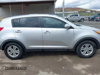 2011 Kia Sportage LX with VIN KNDPB3A21B7059725, listed as a IAAI auction lot 41814298 with 178,023 mi miles and . Bid and sale history available at carsss.com. Image 14.