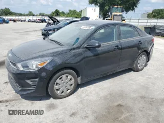 2023 Kia Rio LX z VIN 3KPA24AD7PE533844, wystawiony jako Copart lot #54394355 z przebiegiem 99 383 mil mil oraz Szkoda całkowita • Salvage title. Historia ofert i sprzedaży dostępna na DreamBid. Obrazek 1.