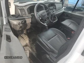 2023 Ford Transit Cargo with VIN 1FTBR1C88PKB19760, listed as a Copart auction lot 49689595 with 40,928 mi miles and Salvage Title. Bid and sale history available at DreamBid. Image 8.