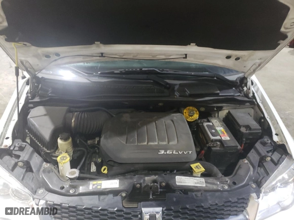 2016 Dodge Grand Caravan American Value Pkg with VIN 2C4RDGBG3GR332352, listed as a Copart auction lot 86487074 with 249,034 mi miles and Salvage Title. Bid and sale history available at carsss.com. Image 12.