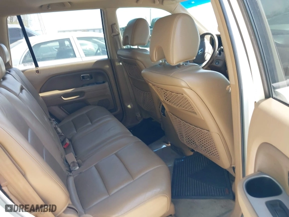 2007 Honda Pilot EX-L with VIN 5FNYF18567B032406, listed as a IAAI auction lot 42120219 with 205,687 mi miles. Bid and sale history available at carsss.com. Image 8.