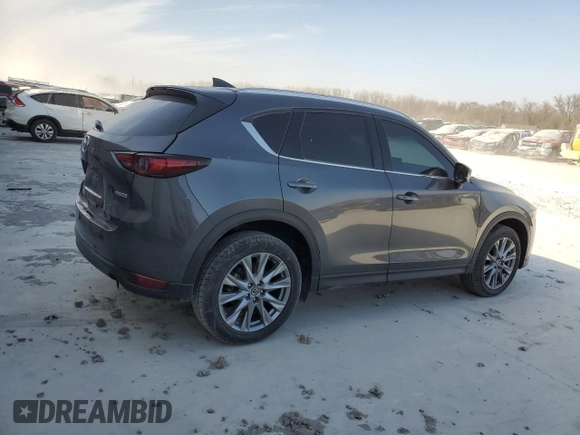 2021 Mazda CX-5 Grand Touring with VIN JM3KFBDM0M1464817, listed as a Copart auction lot 48821965 with 53,648 mi miles and Clean Title. Bid and sale history available at carsss.com. Image 3.