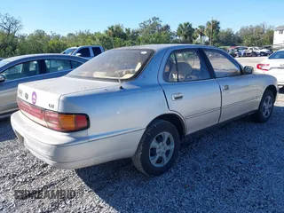1994 Toyota Camry LE with VIN 4T1SK12E9RU351895, listed as a IAAI auction lot 41239573 with 184,866 mi miles. Bid and sale history available at carsss.com. Image 4.