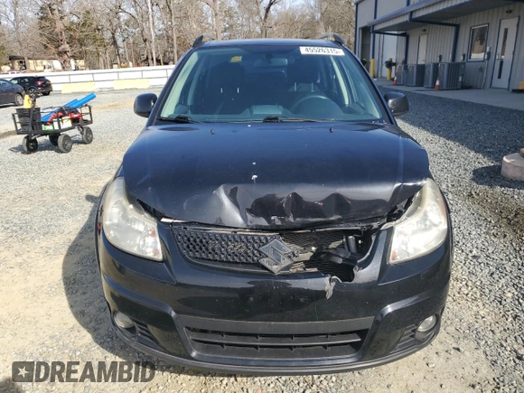 2010 Suzuki SX4 Touring with VIN JS2YB5A70A6300518, listed as a Copart auction lot 45526315 with 161,090 mi miles and Salvage Title. Bid and sale history available at carsss.com. Image 5.