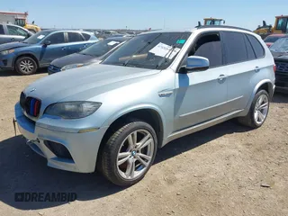 2011 BMW X5 M with VIN 5YMGY0C53BLK26167, listed as a IAAI auction lot 41742529 with 118,777 mi miles. Bid and sale history available at carsss.com. Image 20.