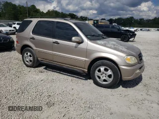 2002 Mercedes-Benz M-Class with VIN 4JGAB54E72A322046, listed as a Copart auction lot 74393084 with 128,015 mi miles and Salvage Title. Bid and sale history available at carsss.com. Image 4.