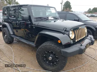 2014 Jeep Wrangler Unlimited Sahara with VIN 1C4HJWEG1EL202974, listed as a IAAI auction lot 41591870 with 17,174 mi miles. Bid and sale history available at carsss.com. Image 1.