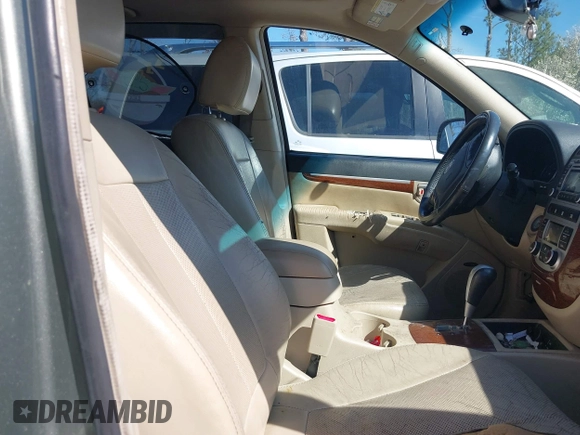 2009 Hyundai Santa Fe SE z VIN 5NMSH13E79H322081, wystawiony jako IAAI lot #41767949 z przebiegiem 179 344 mil mil oraz . Historia ofert i sprzedaży dostępna na DreamBid. Obrazek 5.