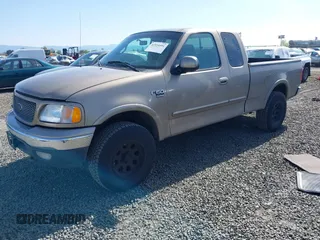 2001 Ford F-150 XL z VIN 1FTRX18WX1NA13022, wystawiony jako IAAI lot #41954491 z przebiegiem 126 284 mil mil oraz . Historia ofert i sprzedaży dostępna na DreamBid. Obrazek 2.
