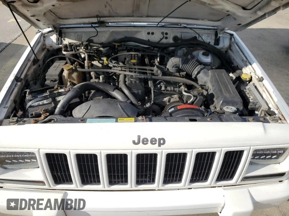 1998 Jeep Cherokee Sport with VIN 1J4FT68S7WL174028, listed as a Copart auction lot 73812524 with 0 mi miles and Salvage Title. Bid and sale history available at carsss.com. Image 12.