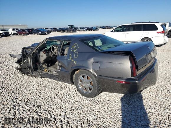 1999 Cadillac Eldorado Touring z VIN 1G6ET1299XU612153, wystawiony jako Copart lot #86257044 z przebiegiem Nie podano mil oraz Nie do naprawy. Historia ofert i sprzedaży dostępna na DreamBid. Obrazek 2.
