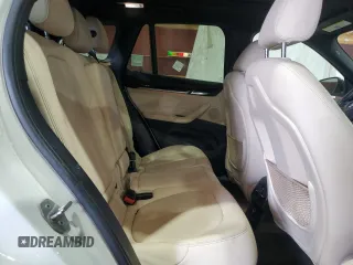 2017 BMW X1 xDrive28i with VIN WBXHT3Z34H4A54811, listed as a Copart auction lot 63584405 with 92,699 mi miles and Salvage title. Bid and sale history available at DreamBid. Image 11.