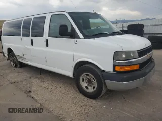 2014 Chevrolet Express Passenger LT with VIN 1GAZG1FGXE1157798, listed as a Copart auction lot 64301595 with 272,982 mi miles and Clean title. Bid and sale history available at DreamBid. Image 4.