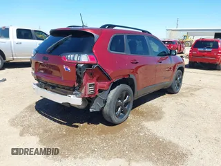 2019 Jeep Cherokee Latitude Plus with VIN 1C4PJMLB7KD384984, listed as a IAAI auction lot 42243845 with 60,914 mi miles and . Bid and sale history available at DreamBid. Image 4.
