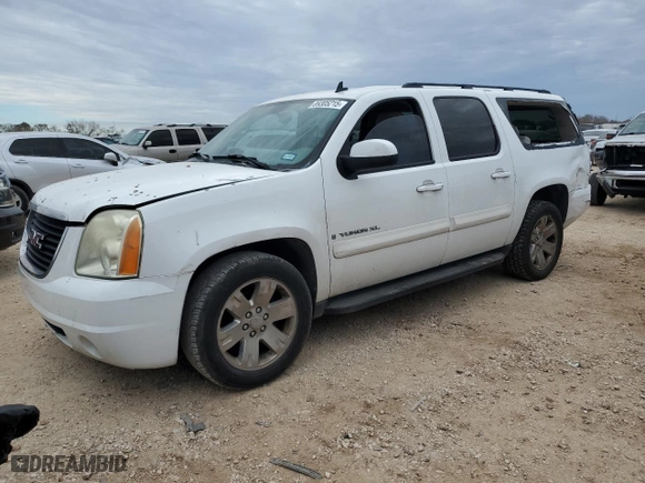 2007 GMC Yukon XL SLE with VIN 1GKFC16J87J300661, listed as a Copart auction lot 89305215 with 194,424 mi miles and Salvage Title. Bid and sale history available at carsss.com. Image 1.