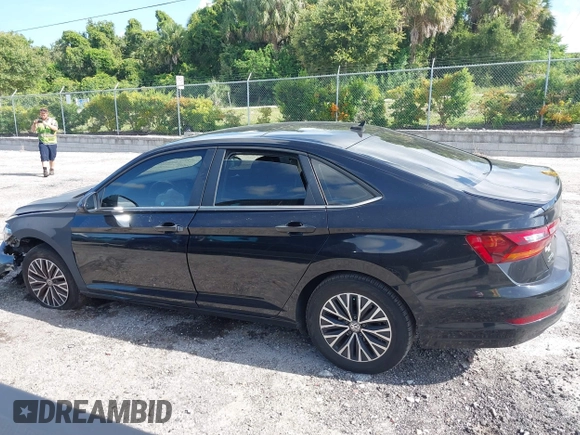 2019 Volkswagen Jetta SEL with VIN 3VWEB7BU7KM193642, listed as a IAAI auction lot 42718572 with 124,633 mi miles and . Bid and sale history available at DreamBid. Image 14.