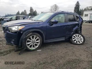 2014 Mazda CX-5 Grand Touring with VIN JM3KE2DY5E0320497, listed as a Copart auction lot 42530195 with 90,391 mi miles and Salvage Title. Bid and sale history available at carsss.com. Image 1.