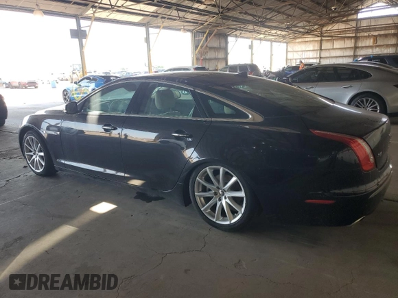 2013 Jaguar XJ z VIN SAJWA1C77D8V40055, wystawiony jako Copart lot #60461395 z przebiegiem 102 709 mil mil oraz Czysty tytuł • Clean title. Historia ofert i sprzedaży dostępna na DreamBid. Obrazek 2.