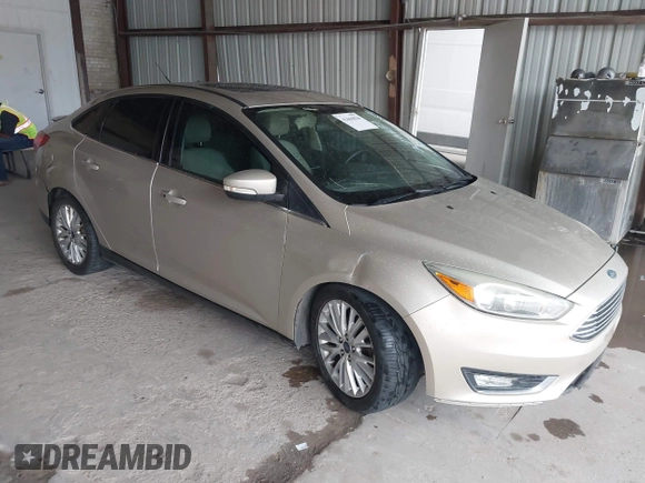 2017 Ford Focus Titanium with VIN 1FADP3J26HL279839, listed as a IAAI auction lot 42466826 with 202,795 mi miles and . Bid and sale history available at DreamBid. Image 1.