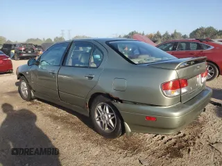 2002 Infiniti G20 Luxury z VIN JNKCP11AX2T509549, wystawiony jako Copart lot #74531114 z przebiegiem 158 364 mil mil oraz Szkody całkowita. Historia ofert i sprzedaży dostępna na DreamBid. Obrazek 2.