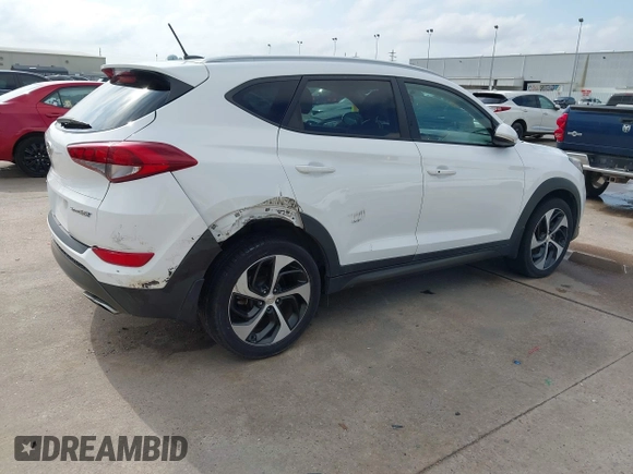 2016 Hyundai Tucson Limited with VIN KM8J33A21GU079870, listed as a IAAI auction lot 42074089 with 78,328 mi miles. Bid and sale history available at carsss.com. Image 4.