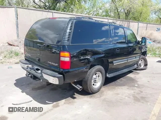 2003 Chevrolet Suburban LT z VIN 3GNGC26G83G210035, wystawiony jako IAAI lot #42084859 z przebiegiem 145 919 mil mil oraz . Historia ofert i sprzedaży dostępna na DreamBid. Obrazek 4.