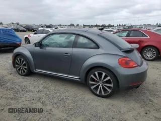 2012 Volkswagen Beetle 2.0T Turbo w/Sun/Snd/Nav PZEV with VIN 3VWVA7AT5CM630812, listed as a Copart auction lot 54419635 with 125,579 mi miles and Clean Title. Bid and sale history available at carsss.com. Image 2.