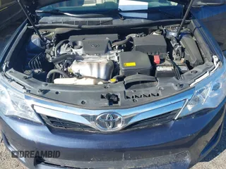 2014 Toyota Camry L with VIN 4T1BF1FK3EU820882, listed as a IAAI auction lot 42012278 with 174,000 mi miles and . Bid and sale history available at DreamBid. Image 10.