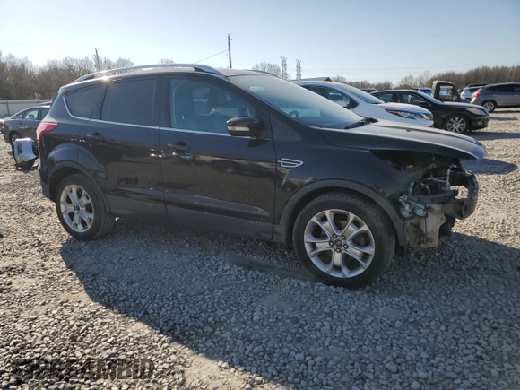 2016 Ford Escape Titanium with VIN 1FMCU0JX5GUB95220, listed as a Copart auction lot 48176575 with 121,210 mi miles and Salvage Title. Bid and sale history available at carsss.com. Image 4.