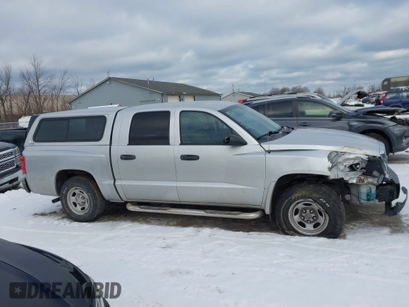 2006 Dodge Dakota ST with VIN 1D7HE28K56S636387, listed as a IAAI auction lot 41305723 with 104,821 mi miles and . Bid and sale history available at carsss.com. Image 13.