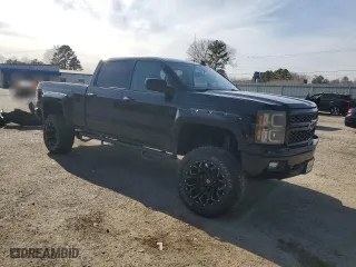2015 Chevrolet Silverado 1500 LT with VIN 3GCUKREC3FG154371, listed as a Copart auction lot 48111035 with 143,405 mi miles and Salvage Title. Bid and sale history available at carsss.com. Image 4.