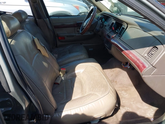 2001 Mercury Grand Marquis LS with VIN 2MEFM75W21X664449, listed as a IAAI auction lot 41898463 with 290,047 mi miles and . Bid and sale history available at DreamBid. Image 5.