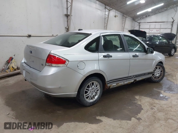 2011 Ford Focus SE with VIN 1FAHP3FN1BW120916, listed as a IAAI auction lot 42106878 with 107,166 mi miles. Bid and sale history available at carsss.com. Image 4.