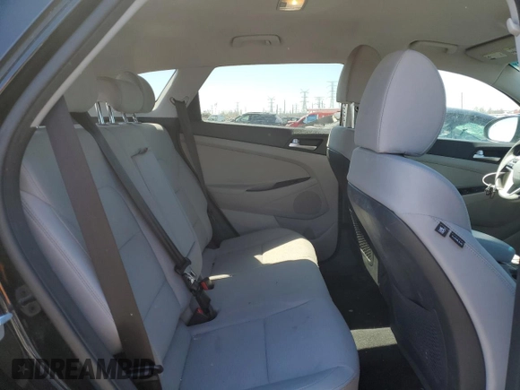 2019 Hyundai Tucson Value with VIN KM8J33A43KU888877, listed as a Copart auction lot 52191305 with 77,204 mi miles and Salvage title. Bid and sale history available at DreamBid. Image 10.
