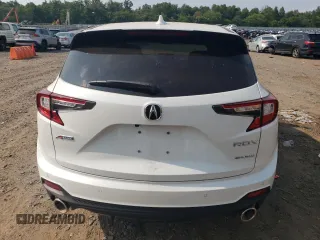 2023 Acura RDX Advance with VIN 5J8TC2H82PL009304, listed as a Copart auction lot 65121524 with 4,957 mi miles and Salvage title. Bid and sale history available at DreamBid. Image 6.