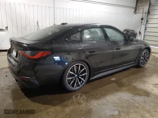 2022 BMW i4 eDrive40 with VIN WBY73AW02NFM83593, listed as a Copart auction lot 69718443 with 3,352 mi miles. Bid and sale history available at carsss.com. Image 3.