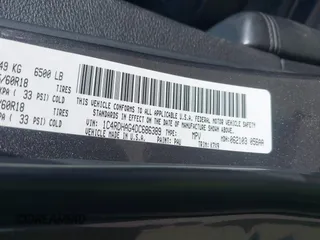 2013 Dodge Durango SXT with VIN 1C4RDHAG4DC686389, listed as a IAAI auction lot 42440260 with 166,952 mi miles and . Bid and sale history available at DreamBid. Image 9.