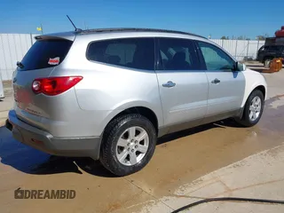 2012 Chevrolet Traverse 1LT with VIN 1GNKRGED5CJ370286, listed as a IAAI auction lot 40425141 with 125,280 mi miles and . Bid and sale history available at DreamBid. Image 4.